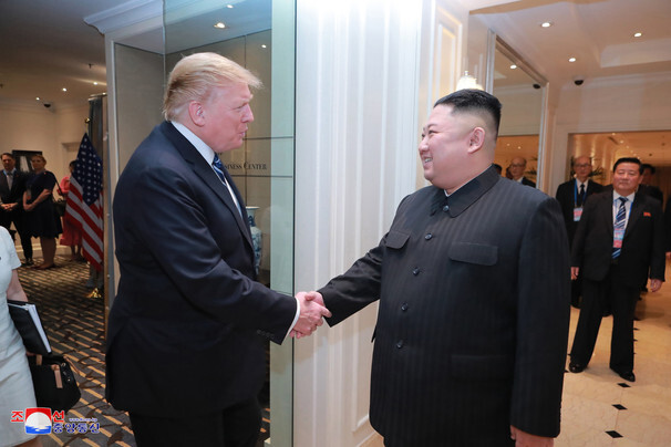 North Korean leader Kim Jong-un and US President Donald Trump shake hands during their summit in Hanoi, Vietnam, in February 2019. `