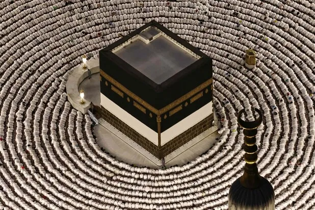 Muslims praying near the Kaaba in Mecca ahead of the annual Hajj