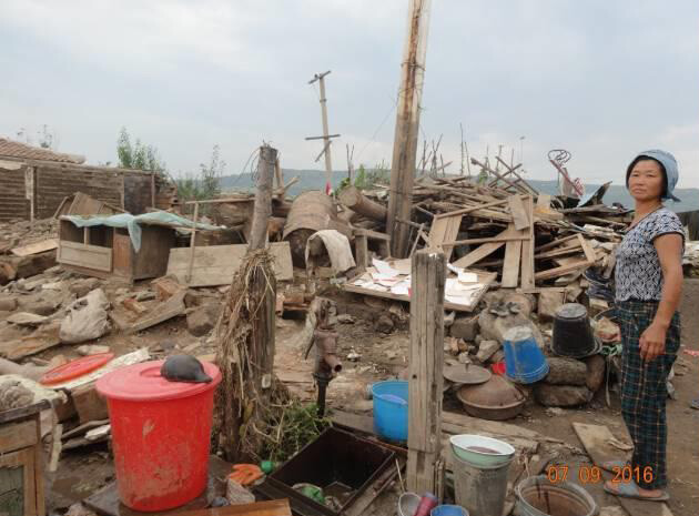 International Federation of Red Cross and Red Crescent Societies personnel assess flood damage in Maenyang Dong