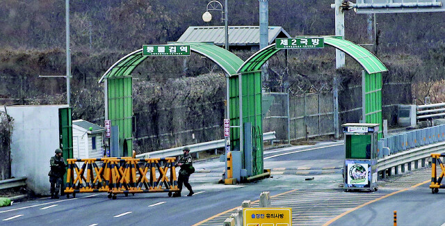 South Korean soldiers erect a barricade on the road to the Inter-Korean Transit Office in Paju