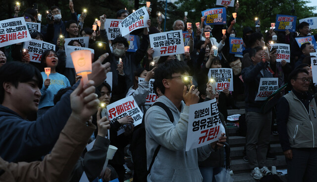 岸田文雄首相の訪韓を控えた6日、市民団体「韓日歴史正義と平和行動」の関係者らは韓日関係の懸案を解決するため、ろうそく通夜を行った。福島の汚染水流出とソウルの清渓広場近くでの韓国、米国、日本の軍事演習。 ニュース