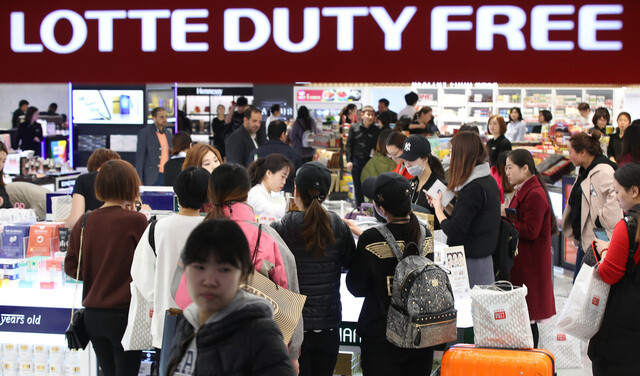 Shoppers at a Lotte Duty Free store in central Seoul