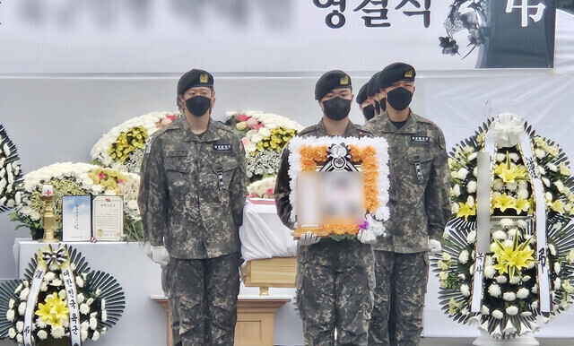 Soldiers bear the palls for a fellow serviceman who died two days after fainting during a pack drill. The ceremony took place on May 30, 2024, at a funeral hall in Naju, South Jeolla Province. (Yonhap)