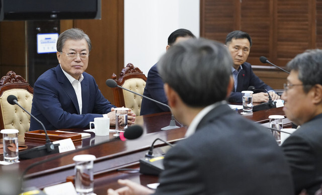 South Korean President Moon Jae-in consults with health professionals regarding the coronavirus outbreak at the Blue House on Feb. 2.