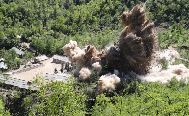North Korea detonated its nuclear test site in Punggye, a rural village or “ri” in Kilju County, North Hamgyong Province, on May 25, 2018. (pool photo)