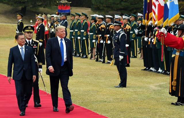 US President Donald Trump and South Korea President Moon Jae-in review a joint services honor guard at the official welcoming ceremony at the Blue House in honor of Trump’s visit on Nov. 7.