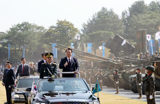 President Yoon Suk-yeol takes part in a military parade Saturday at a ceremony to mark South Korea’s 74th Armed Forces Day, held at the Gyeryongdae military headquarters in South Chungcheong Province. (Yonhap)