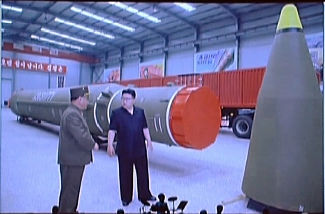 North Korean leader Kim Jong-un observes the final assembly site of the Hwasong-14 intercontinental ballistic missile (ICBM)