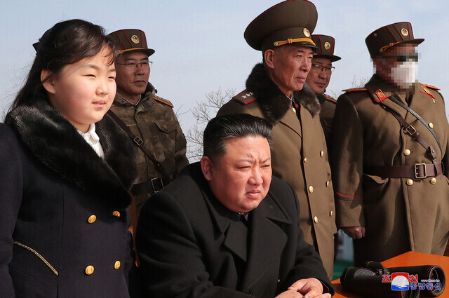 North Korean leader Kim Jong-un and daughter Kim Ju-ae observed drills by North’s tactical nuclear operation units on March 18-19, according to a March 20 report by state-run Korea Central News Agency. (KCNA/Yonhap)
