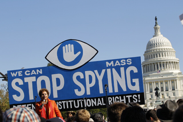 Members of the American Civil Liberties Union hold a protest in Washington DC calling on Congress to investigate the NSA’s mass surveillance programs