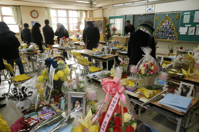 Visitors and bereaved families at a Danwon High School classroom in Ansan