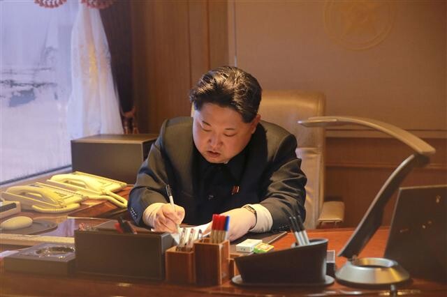 North Korean leader Kim Jong-un signed his approval for the country to launch its long-range Kwangmyongsong 4 rocket