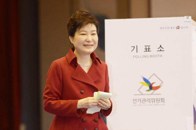 President Park Geun-hye votes in the general election near the Blue House in Seoul
