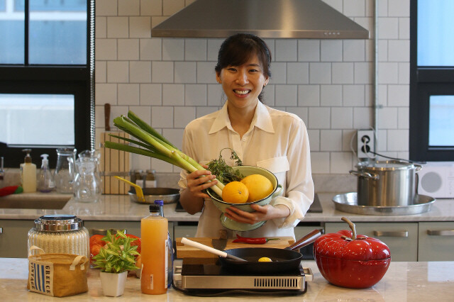 Market Kurly’s CEO Sophie Kim at her office in Seoul with some of the food items the website sells