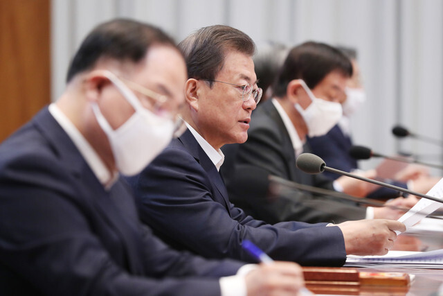 South Korean President Moon Jae-in makes opening remarks during the third meeting of the emergency economic council at the Blue House on Mar. 30. (Blue House photo pool)