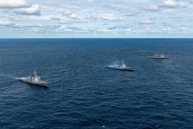 Korean, American and Japanese ships take part in a joint naval defense exercise in international waters to the east of Korea in October. (courtesy of the US Defense Department)