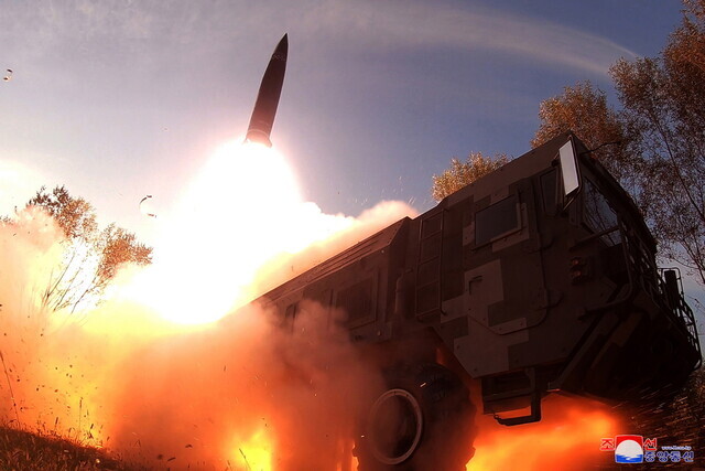 North Korea fires off a short-range missile during military exercises in October 2022. (KCNA/Yonhap)