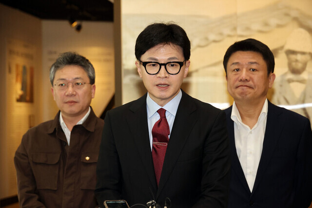 People Power Party interim leader Han Dong-hoon takes questions from reporters after taking part in a discussion with senior leaders of the Medical Professors Association of Korea at Severance Hospital in Seoul on March 24, 2024. (Yonhap)