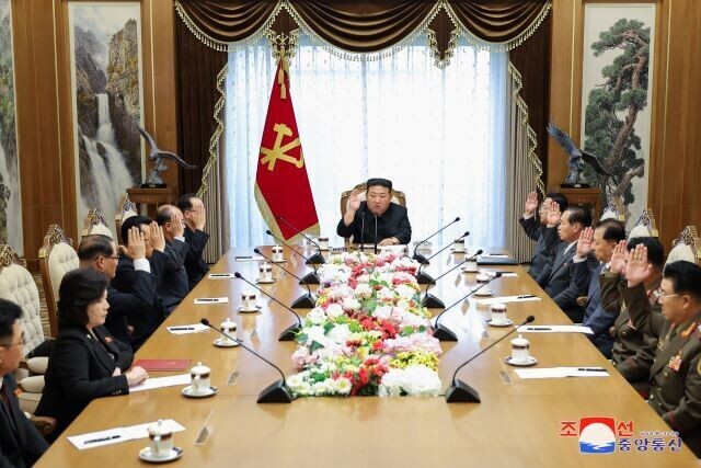 North Korean leader Kim Jong-un (center) leads a meeting of the Workers’ Party of Korea Politburo, where the bureau moved to convene the 10th plenary meeting of the eighth WPK Central Committee, according to a report by the party-run Rodong Sinmun on May 25, 2024. (KCNA/Yonhap)