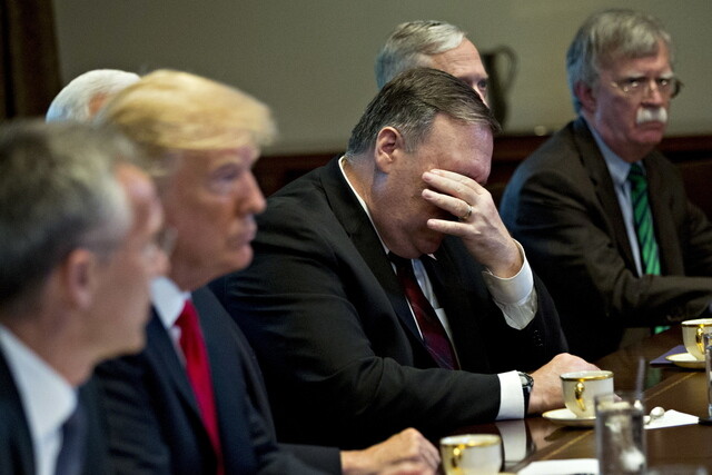 US Secretary of State Mike Pompeo is seen rubbing his eyes during a White House meeting on May 17. Starting from the left are Secretary General Jens Stoltenberg of NATO