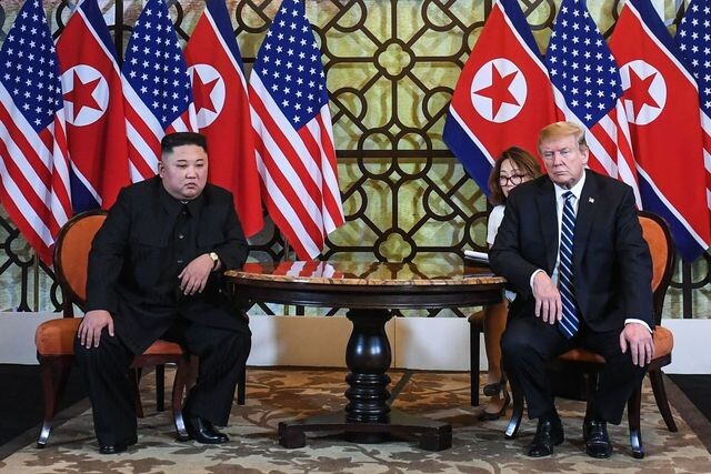 North Korean leader Kim Jong-un and US President Donald Trump begin their one-on-one meeting at the Sofitel Legend Metropole Hanoi hotel on Feb. 28. (AFP/Yonhap News)