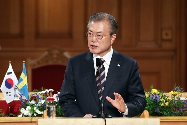 South Korean President Moon Jae-in makes a speech about the Korean Peninsula peace process at the Swedish parliament in Stockholm on June 14.