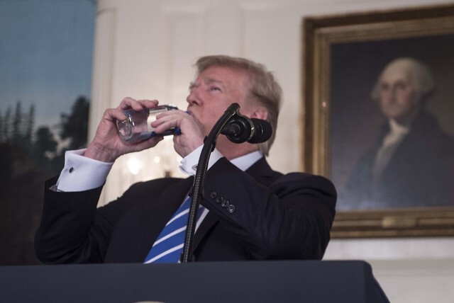 US President Donald Trump drinks from a water bottle in the middle of a speech about his recent trip to Asia at the White House on Nov. 15. Trump was widely mocked on the internet and late night television for drinking water during the speech