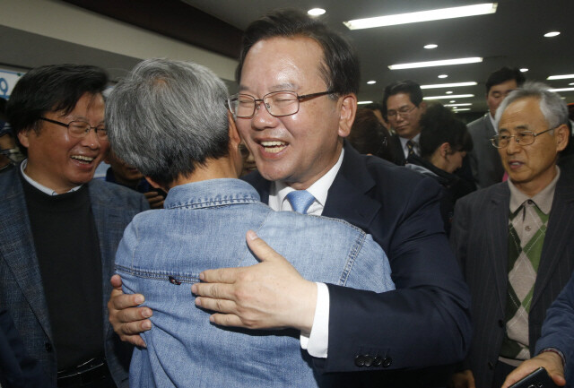 Minjoo Party of Korea candidate Kim Bu-kyeom celebrates in Daegu with supporters