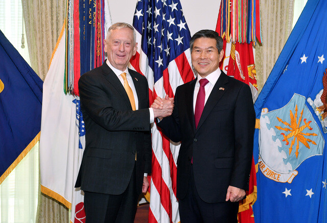 South Korean Defense Minister Jeong Kyeong-doo and US Secretary of Defense James Mattis shake hands before a joint press conference following the 50th South Korea-US Security Consultative Meeting on Oct. 31 in Washington