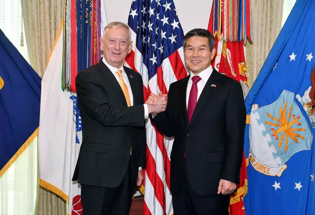 South Korean Defense Minister Jeong Kyeong-doo and US Secretary of Defense James Mattis shake hands before a joint press conference following the 50th South Korea-US Security Consultative Meeting on Oct. 31 in Washington