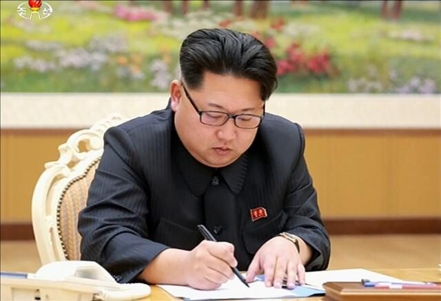 North Korean leader Kim Jong-un signs the order to conduct the North’s fourth nuclear test