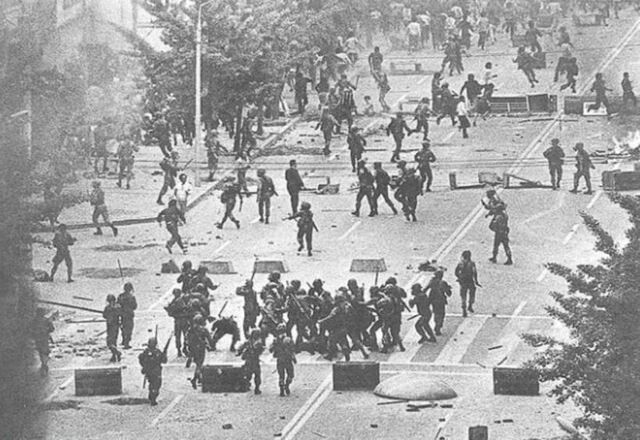 Martial law forces brutally suppress the May 18 Gwangju Democratization Movement of 1980.