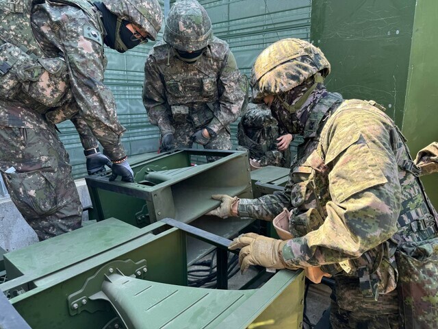 South Korean soldiers inspect loudspeakers during a drill prepping for the commencement of broadcasts to the North in early June 2024. (courtesy of the Joint Chiefs of Staff)