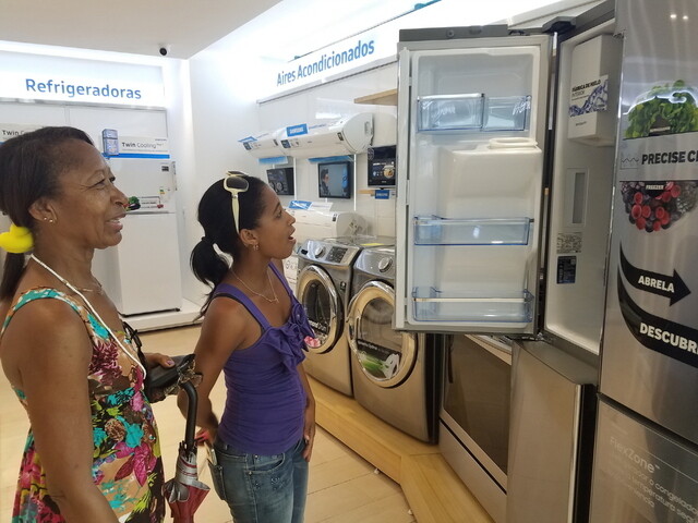 Visitors look at appliances at the Samsung Electronics brand shop in Havana