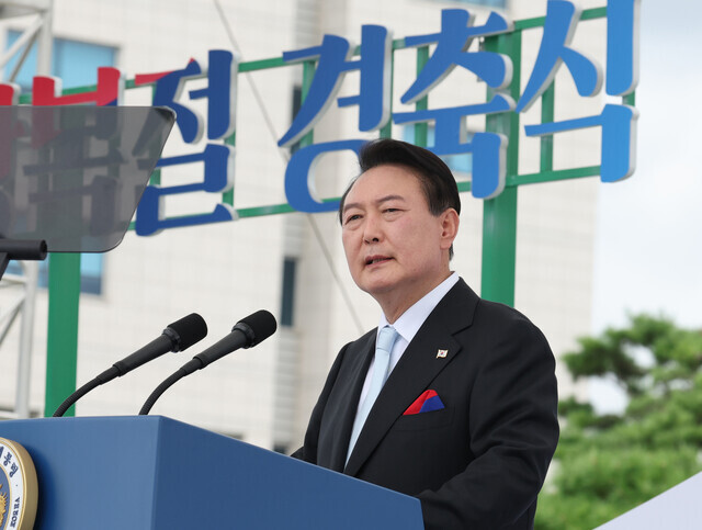 President Yoon Suk-yeol delivers his National Liberation Day address on the lawn of the presidential office in Seoul on Aug. 15. (Yonhap News)
