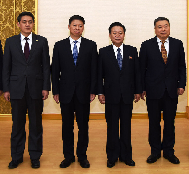 Chinese special envoy Song Tao (second from left) meets with Choi Ryong-hae
