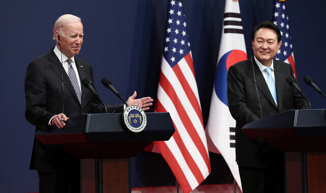 US President Joe Biden smiles as he responds to questions from reporters at a press conference following his summit with the president of South Korea, Yoon Suk-yeol, on May 21, 2022. (presidential office pool photo)