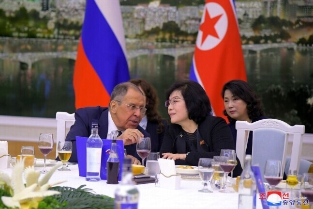 Russian Foreign Minister Sergey Lavrov speaks to North Korean Foreign Minister Choe Son-hui at a welcome banquet held on Oct. 18, 2024, in Pyongyang. (KCNA/Yonhap)