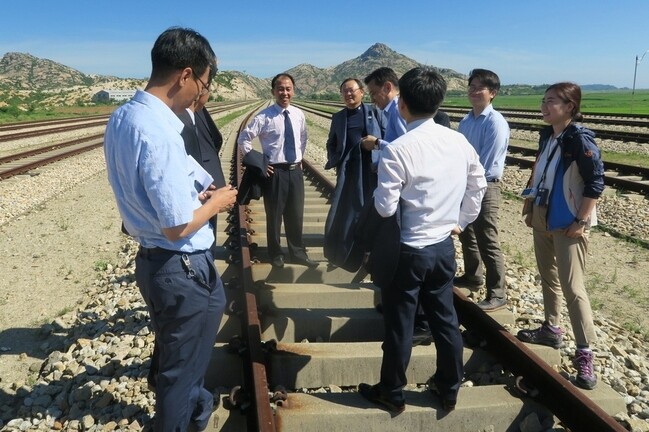 South and North Korean railway experts conduct a joint inspection of a track near Kamho Station