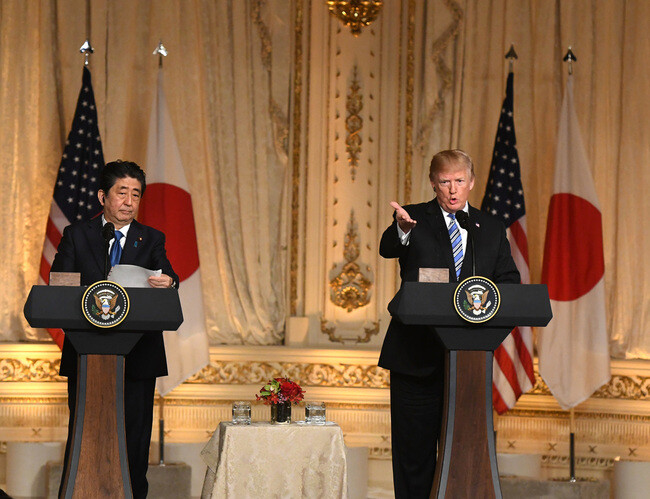 US President Donald Trump and Japanese Prime Minister Shinzo Abe hold a joint press conference at the Mar-a-Lago resort in Palm Beach
