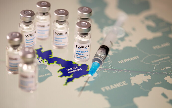 COVID-19 vaccines (Reuters/Yonhap News)