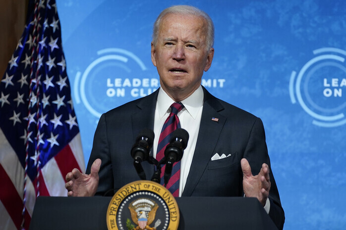 US President Joe Biden delivers opening remarks Thursday to the virtual Leaders Summit on Climate from the East Room of the White House in Washington. (AP)