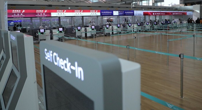 A check-in counter at Incheon International Airport is empty on Jan. 28 amid the coronavirus outbreak. (photo pool)