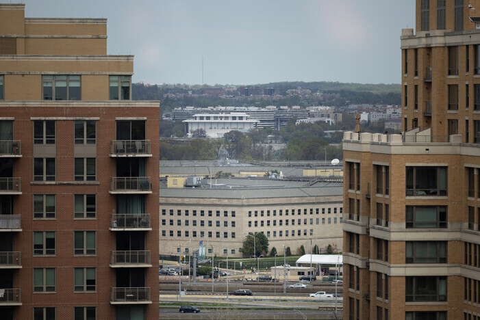 The US Department of Defense building can be seen in a gap between buildings in Arlington, near Washington, on April 6. (Reuters/Yonhap)