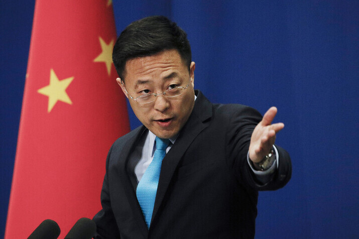 Chinese Foreign Ministry spokesperson Zhao Lijian speaks during a daily briefing at the Chinese Ministry of Foreign Affairs office in Beijing on Feb. 24, 2020. (AP/Yonhap News)