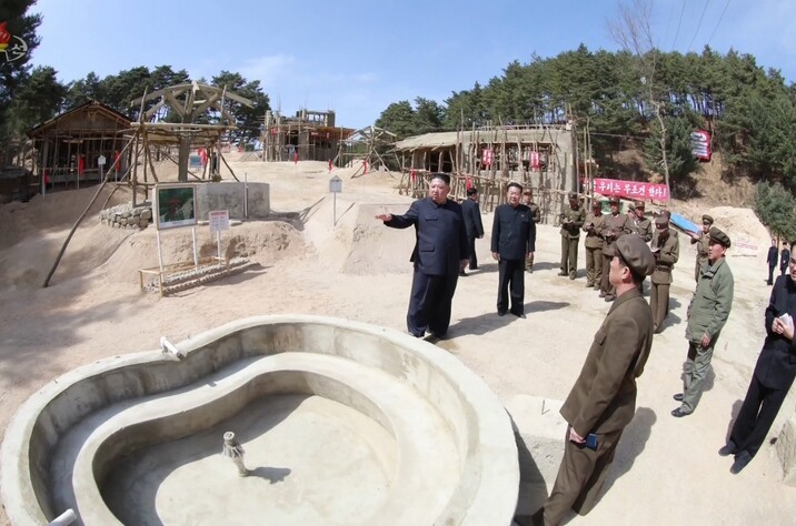 North Korean leader Kim Jong-un conducting on-the-spot guidance of a construction site in Yangdok County