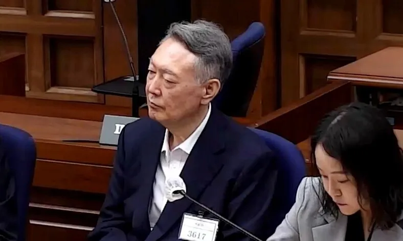 Former President Yoon Suk-yeol attends a first-trial verdict hearing at the Seoul Central District Court