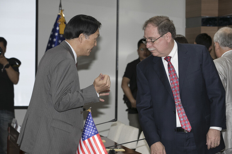 The fourth round of South Korea-US defense cost-sharing negotiations in June 2018 between Jang Won-sam representing South Korea and Timothy Betts representing the US.