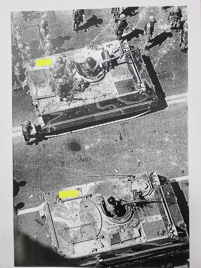 At noon on May 21, 1980, in front of the Jeonil Building on Geumnam-ro, Gwangju, a martial law armored vehicle is aiming machine guns at citizens.  The upper armored vehicle hit and killed a soldier around 1:00 p.m.  Provided by the May 18 Investigation Committee