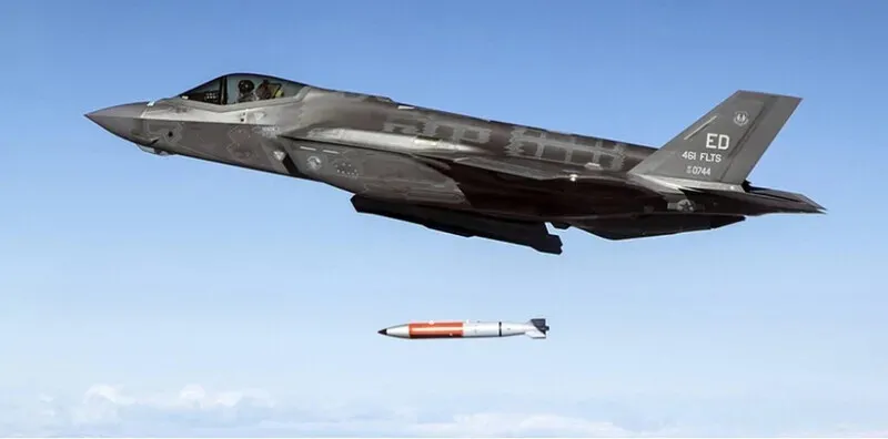 A US F-35 fighter jet drops a dummy B61-12 bomb, which can be used as a tactical nuke, during training. (via Los Alamos National Laboratory)